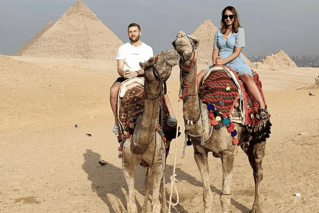 From Cairo Camel ride trip at Giza Pyramids During Sunrise or Sunset.